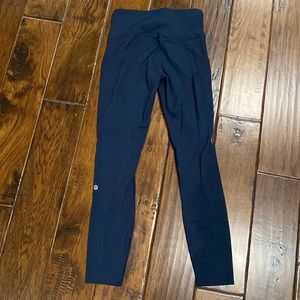Fast and Free 23” navy colored legging by Lululemon